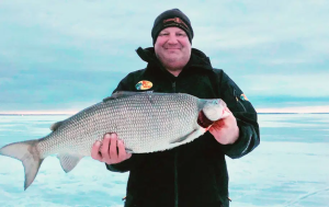 man with large fish